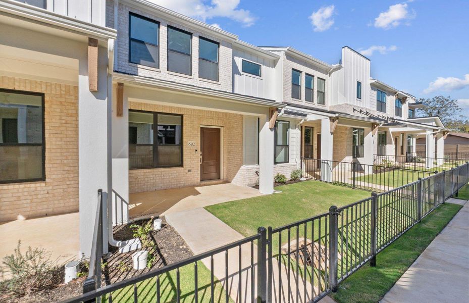 Exterior details and patio area of a home in Monarch on Main, Round Rock (Image 15).