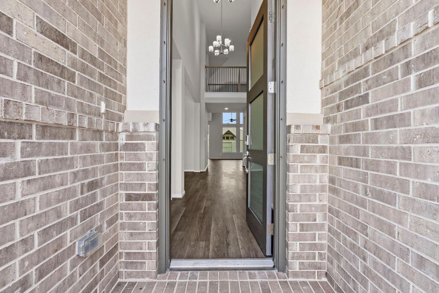 Exterior details and patio area of a home in Pomona, Manvel (Image 3).