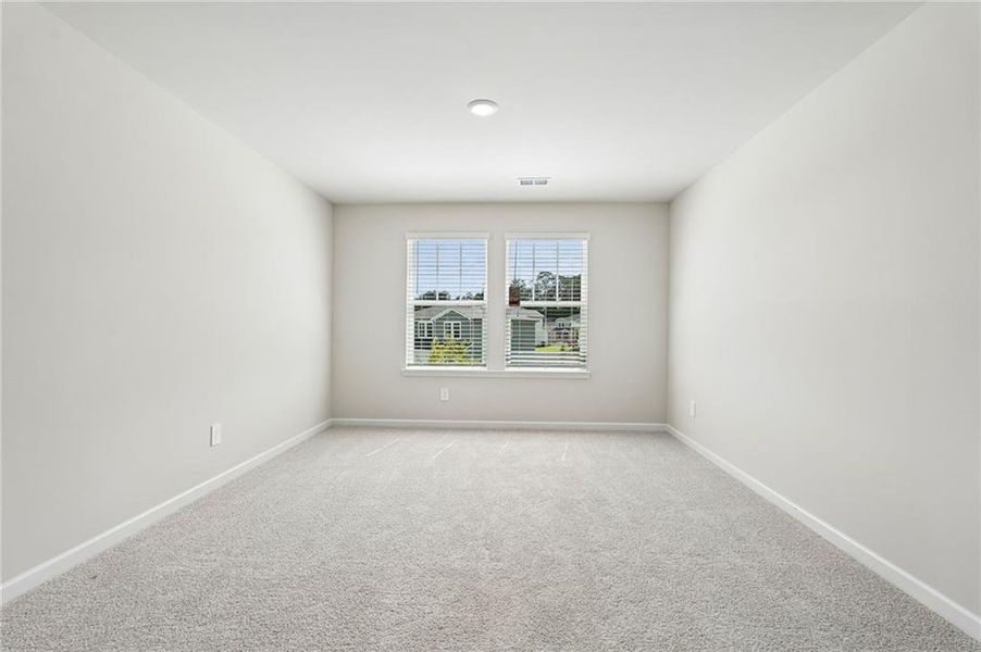Spacious, unfurnished interior of a new home in Northwoods at Mirror Lake, Villa Rica (Image 31).