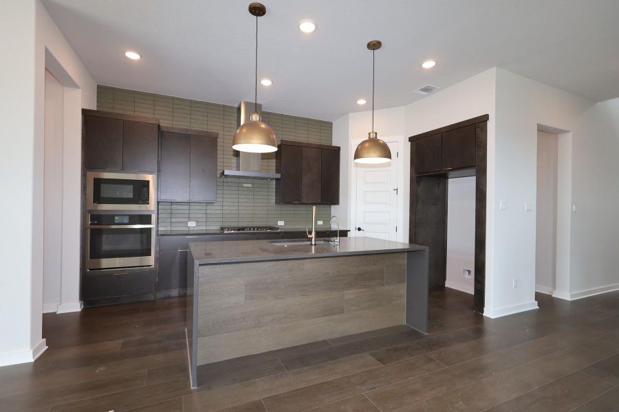 Furnished interior view inside a new home in Wolf Ranch, Georgetown (Image 10).
