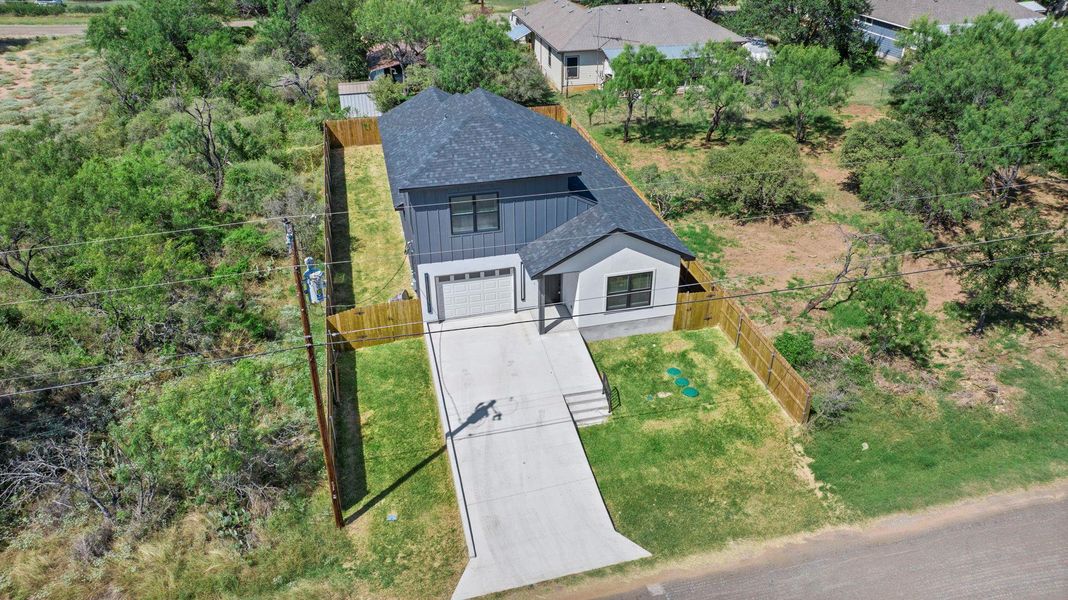 Front exterior of a new home in , Granite Shoals, TX, highlighting curb appeal (Image 23).