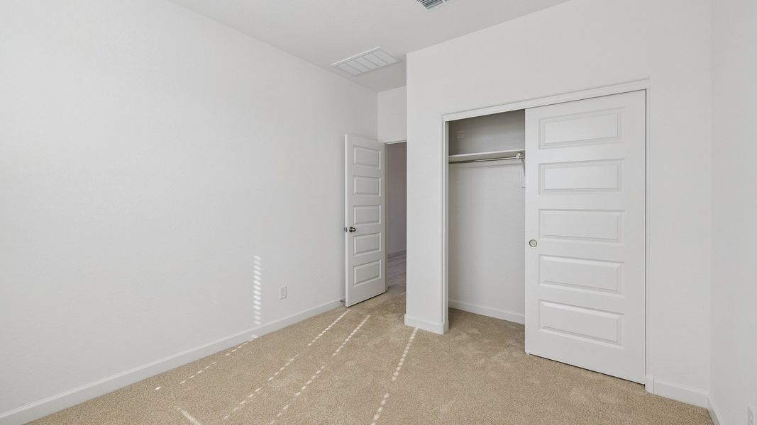 Spacious, unfurnished interior of a new home in Desert Moon Estates, Buckeye (Image 20).