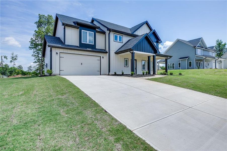 Front exterior of a new home in , Toccoa, GA, highlighting curb appeal (Image 29). Front exterior of a new home in , Toccoa, GA, highlighting curb appeal (Image 29).