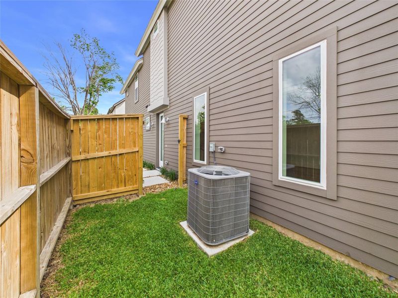 Exterior details and patio area of a home in , Houston (Image 17).