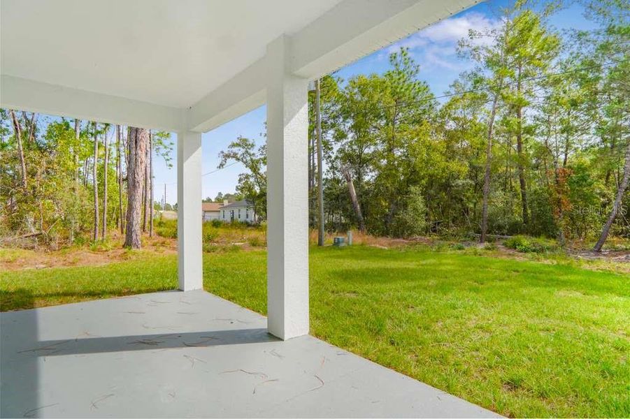 Exterior details and patio area of a home in , Ocala (Image 4).