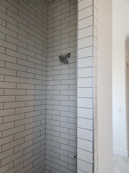 Right Side of Walk-in Master Shower. Shower Head 1 and Interior details with tiled shower