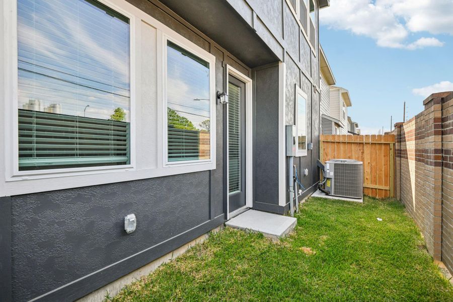 Exterior details and patio area of a home in Spring Brook Village - City Series, Houston (Image 4).
