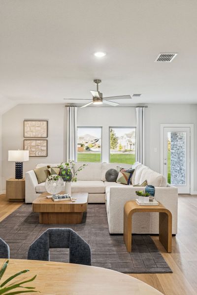 Living Room in the Oscar home plan by Trophy Signature Homes – REPRESENTATIVE PHOTO