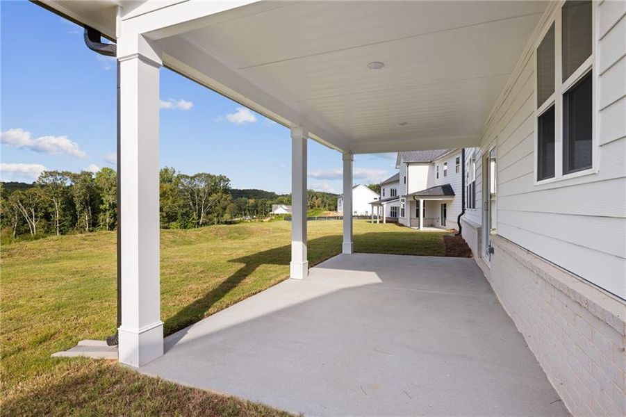 Exterior details and patio area of a home in The Estates at Gainesville Township, Gainesville (Image 23).