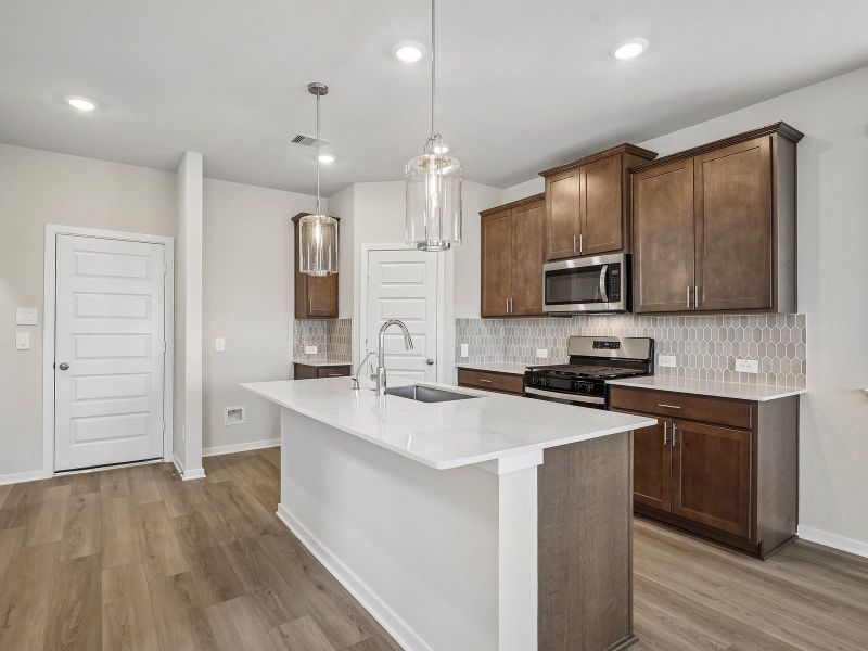 Furnished interior view inside a new home in Parkway Commons - City Series, Missouri City (Image 6).