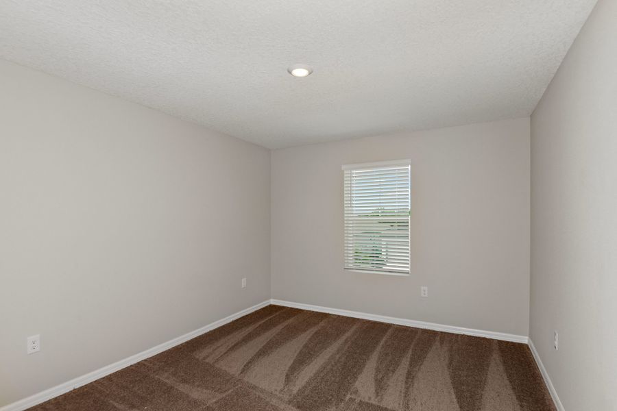 Spacious, unfurnished interior of a new home in Pasadena Ridge, Dade City (Image 24).