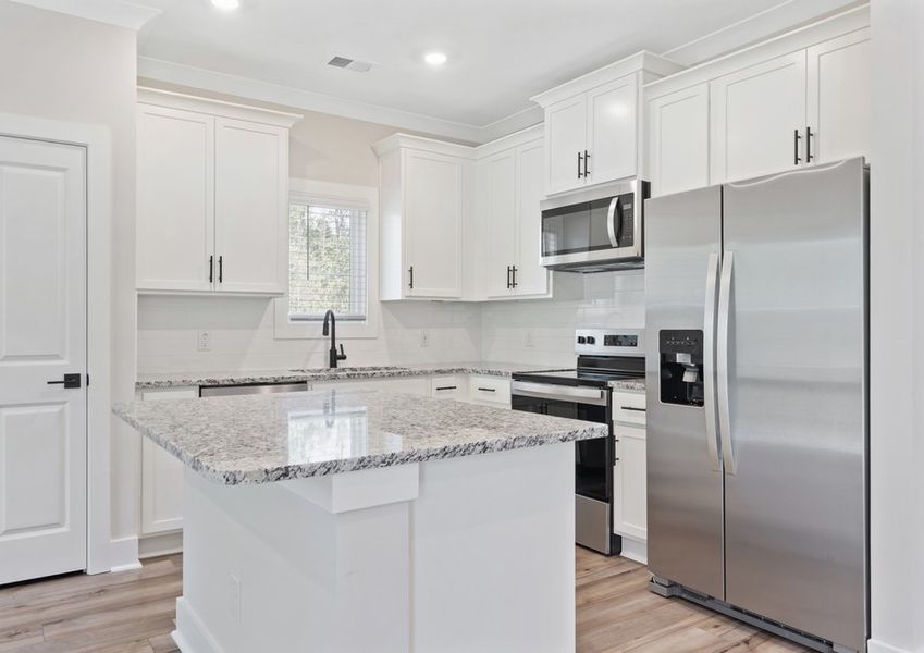 The kitchen has granite countertops