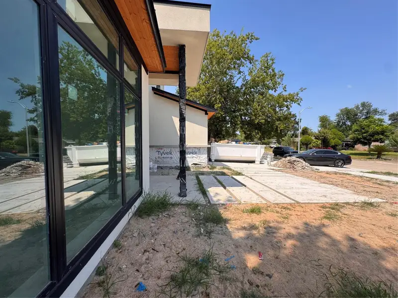 Exterior details and patio area of a home in , Houston (Image 1). Exterior details and patio area of a home in , Houston (Image 1).