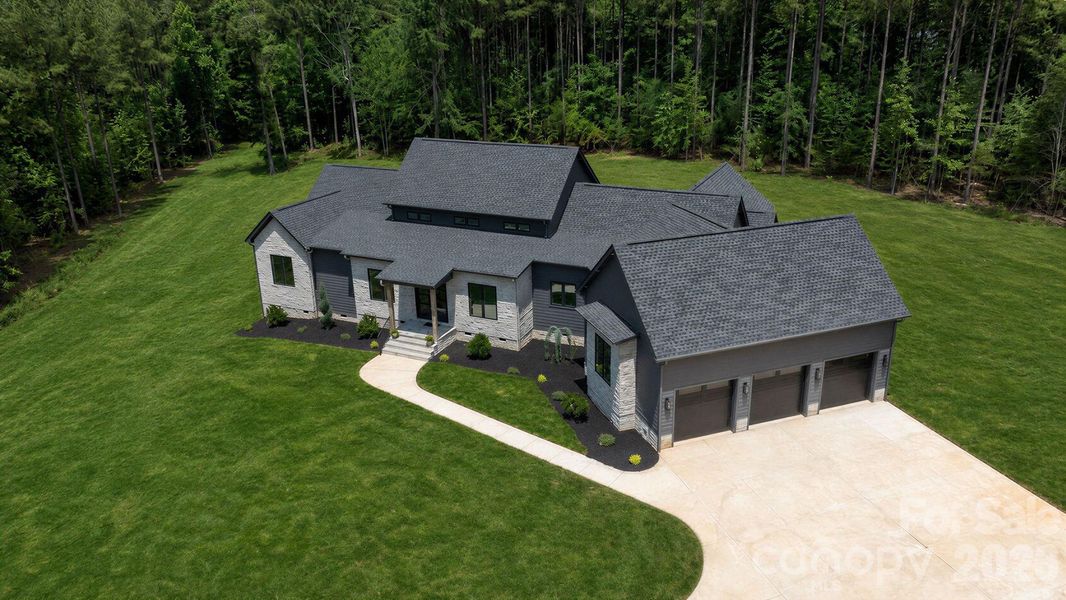 Front exterior of a new home in , Rock Hill, SC, highlighting curb appeal (Image 26).