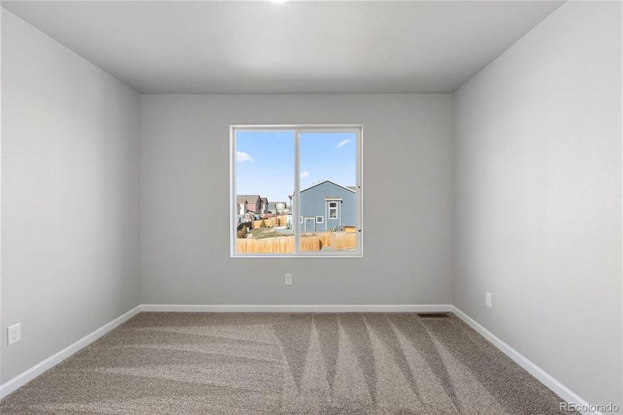 Spacious, unfurnished interior of a new home in Cherry Meadows, Brighton (Image 28).