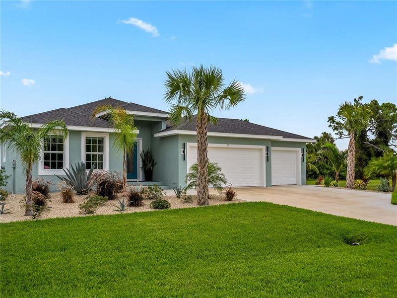 Front exterior of a new home in , Placida, FL, highlighting curb appeal (Image 23).