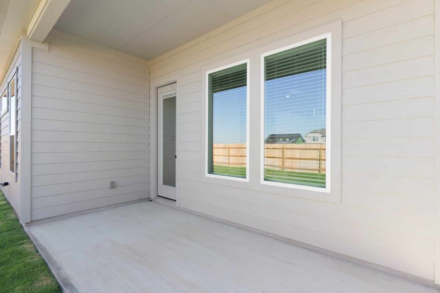 Exterior details and patio area of a home in Lariat, Liberty Hill (Image 3).