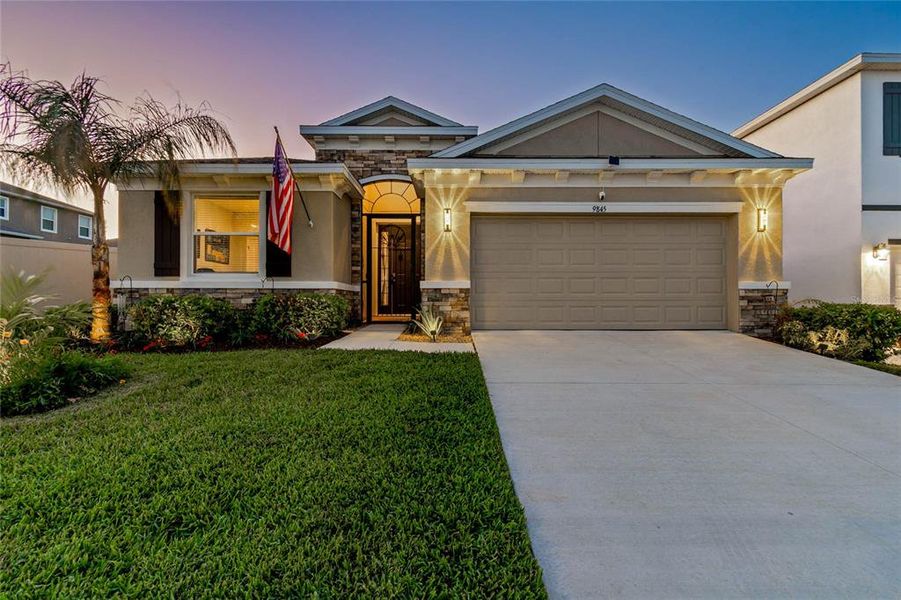 Front exterior of a new home in , Wesley Chapel, FL, highlighting curb appeal (Image 21).