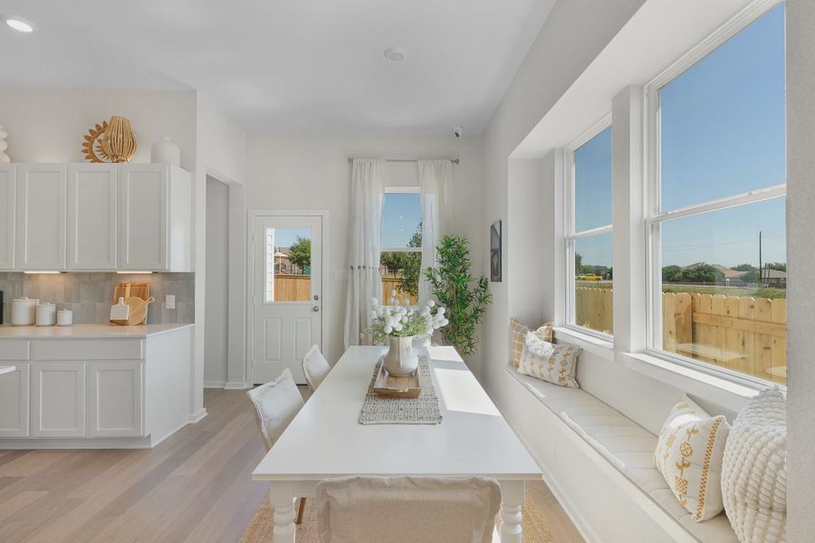 Representative furnished interior of a home built from the Wilshire by Chesmar Homes in Stream Waters, Buda (Image 7).