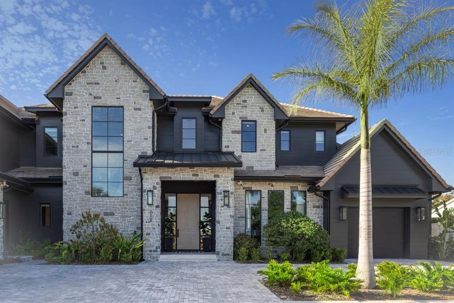 Front exterior of a new home in , Orlando, FL, highlighting curb appeal (Image 24).