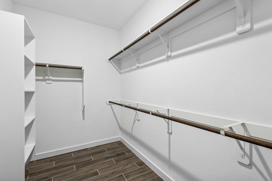 Primary walk-in closet Primary walk-in closet