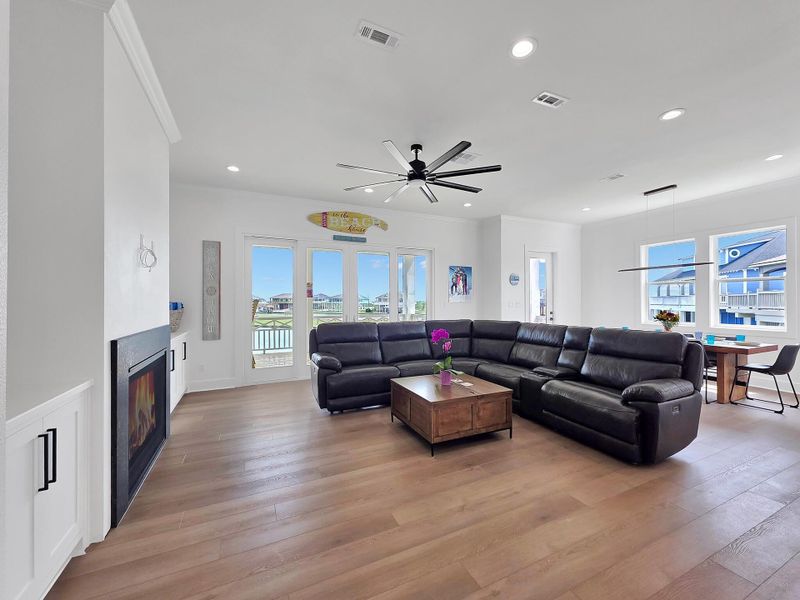 View of spacious living room room with dining room room in the background