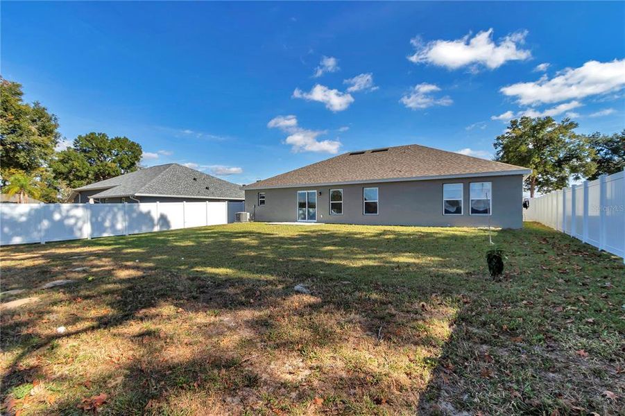 Exterior details and patio area of a home in Diamond Ridge, Belleview (Image 22).