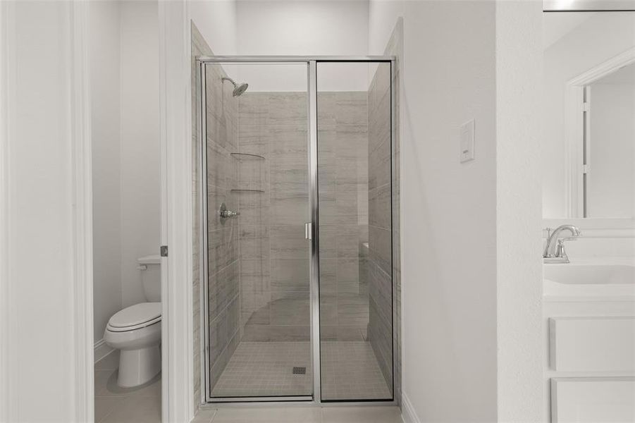 Full bathroom with a stall shower, tile patterned flooring, and vanity Full bathroom with a stall shower, tile patterned flooring, and vanity