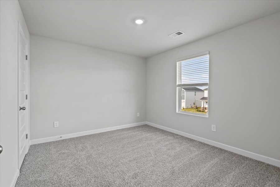 Spacious, unfurnished interior of a new home in Brayfield Manor - Heritage Collection, Wellford (Image 18).