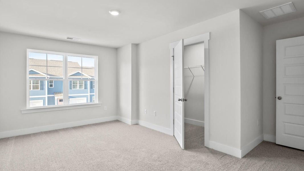 Spacious, unfurnished interior of a new home in Indigo Preserve Townhomes, Leland (Image 21).
