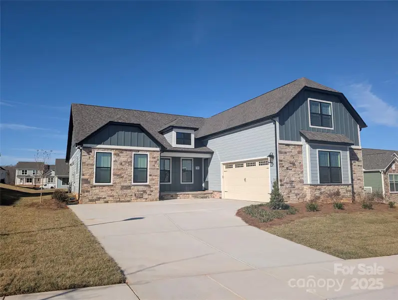 Front exterior of a new home in , Rock Hill, SC, highlighting curb appeal (Image 1).