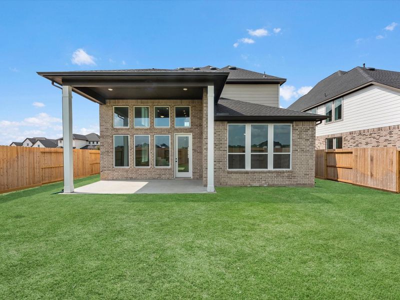 Exterior details and patio area of a home in Pecan Ridge, Fulshear (Image 3).