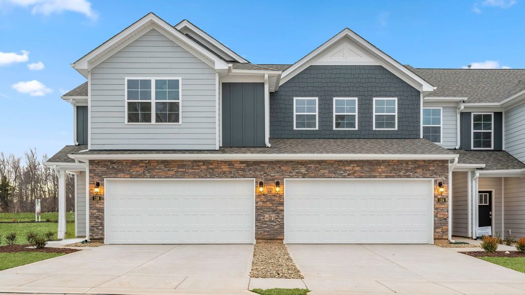 Front exterior of a new home in Lybrook Village, Advance, NC, highlighting curb appeal (Image 1). Front exterior of a new home in Lybrook Village, Advance, NC, highlighting curb appeal (Image 1).