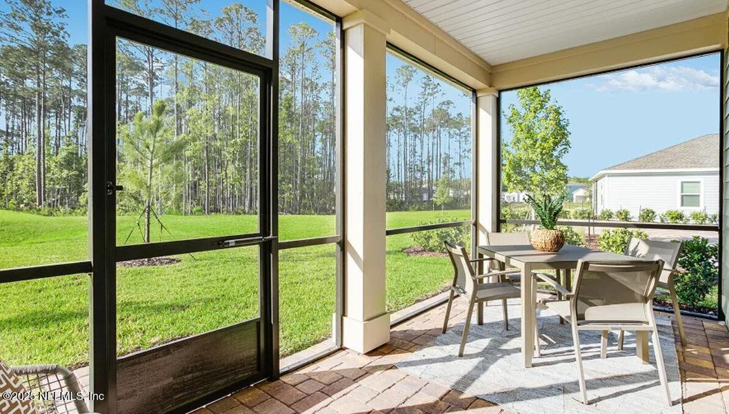 Exterior details and patio area of a home in Saddle Oaks: Saddle Oaks 50s, Jacksonville (Image 1).