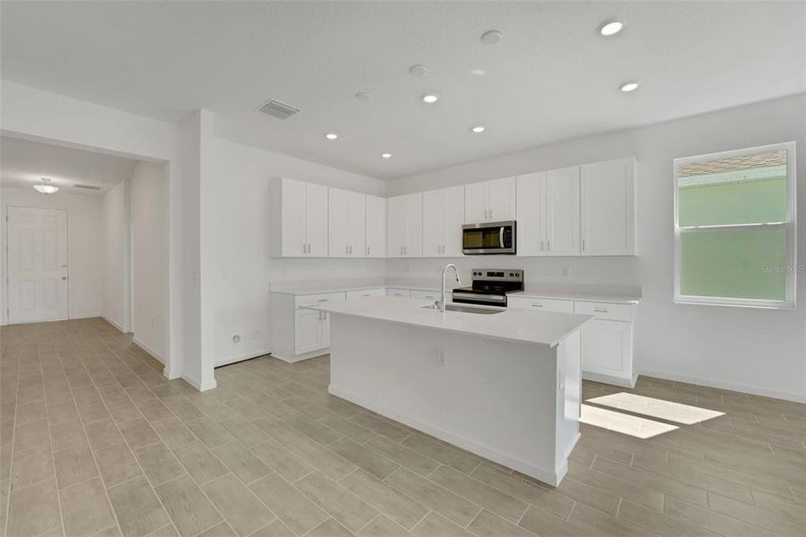 Furnished interior view inside a new home in Willowbrook North, Winter Haven (Image 9).
