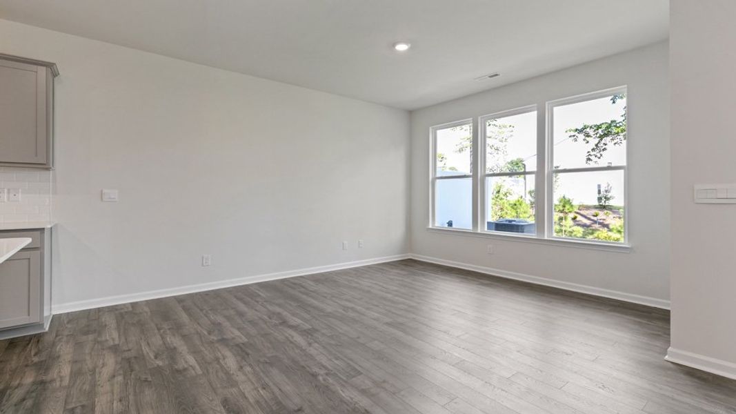 Representative unfurnished interior of a home built from the LANSING - TRADITIONS by D.R. Horton in Chapel Townes, Raleigh (Image 13).