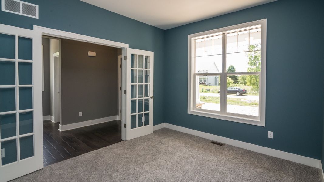 Representative unfurnished interior of a home built from the The Hartland by Norfolk Homes in Coronado Estates, Jackson (Image 49).