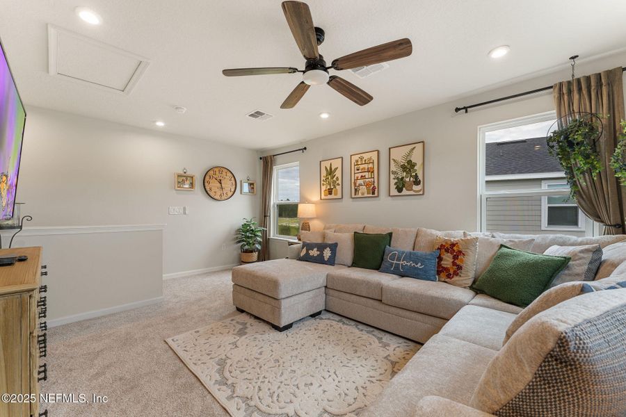 Furnished interior view inside a new home in Seminole Palms Single-Family Homes, Palm Coast (Image 47).