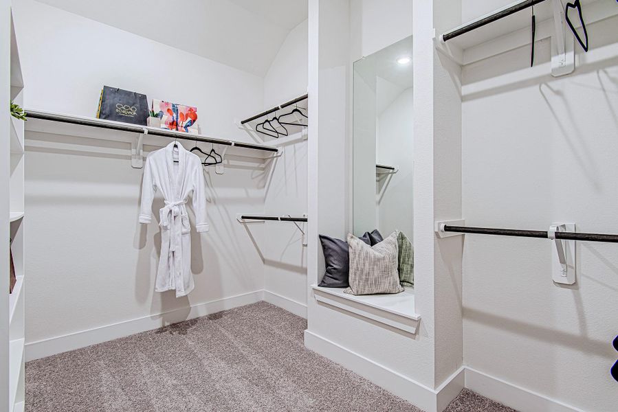 More than just a walk-in—this is a walk-in experience. Designed with purpose and a hint of flair, the spacious layout includes a full-length mirror, open shelving, and a cozy built-in bench for slipping off heels or contemplating life’s next outfit. More than just a walk-in—this is a walk-in experience. Designed with purpose and a hint of flair, the spacious layout includes a full-length mirror, open shelving, and a cozy built-in bench for slipping off heels or contemplating life’s next outfit.