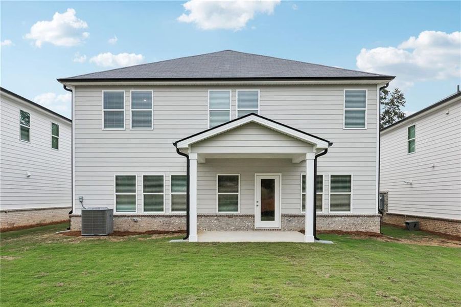 Exterior details and patio area of a home in Westmont Preserve, Powder Springs (Image 27).