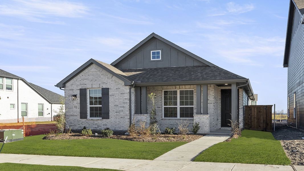 Front exterior of a new home in Waterscape, Royse City, TX, highlighting curb appeal (Image 2). Front exterior of a new home in Waterscape, Royse City, TX, highlighting curb appeal (Image 2).