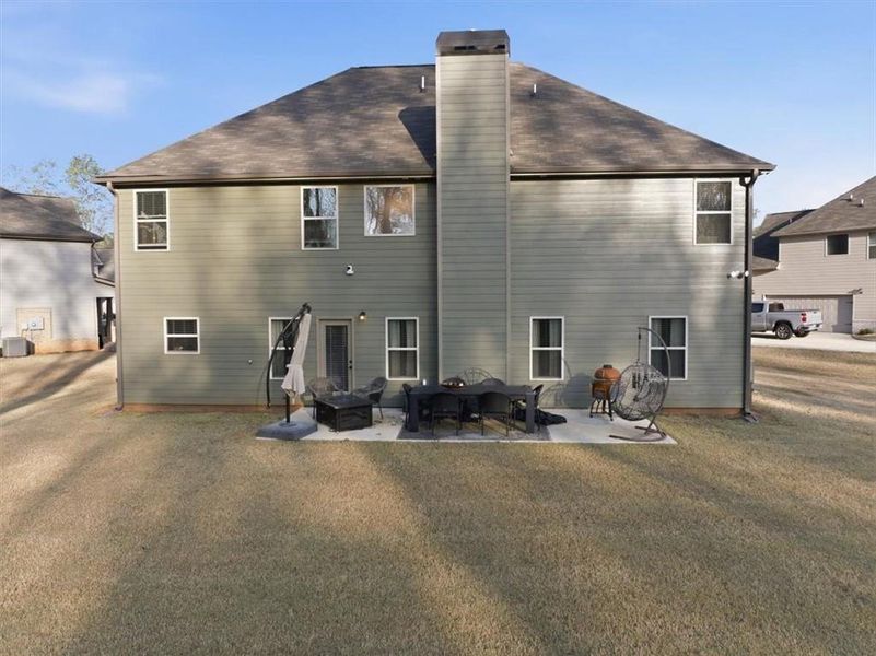 Exterior details and patio area of a home in Nine Oaks, Locust Grove (Image 4).