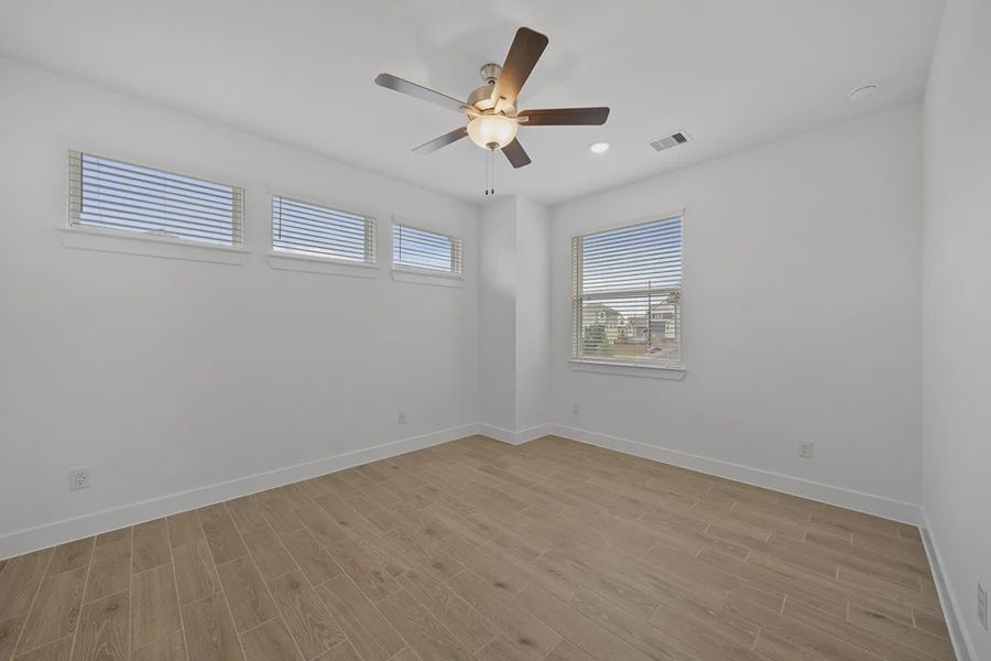Spacious, unfurnished interior of a new home in Elyson Courtyard Collection, Katy (Image 21).