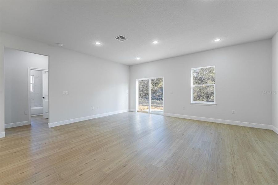The pictures are from a different house but feature the same floor plan and finishes.