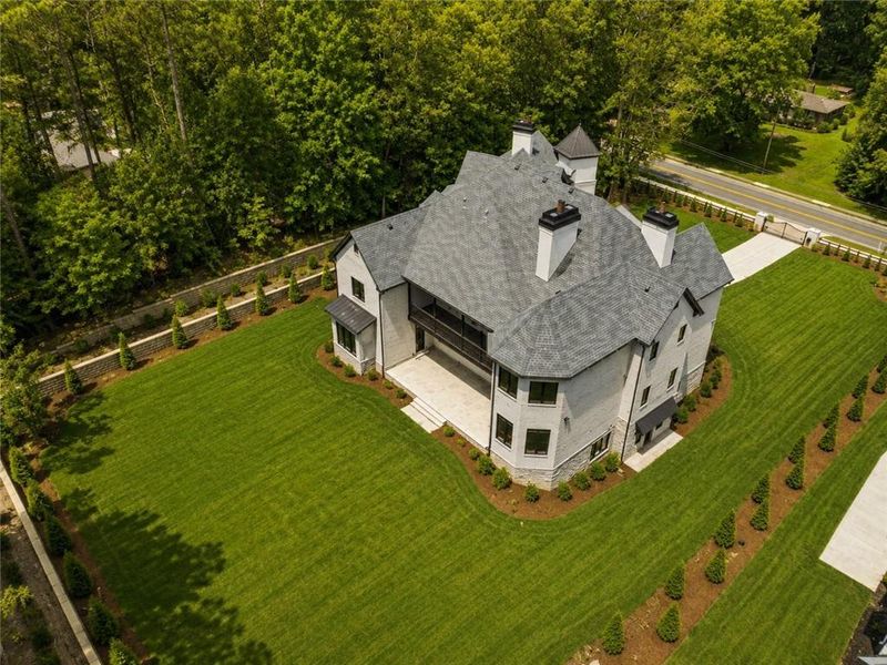 Front exterior of a new home in , Roswell, GA, highlighting curb appeal (Image 28). Front exterior of a new home in , Roswell, GA, highlighting curb appeal (Image 28).