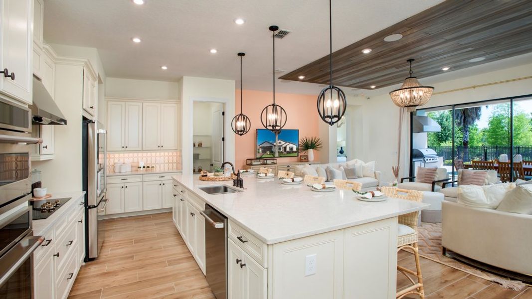 Representative furnished interior of a home built from the Ambra by Taylor Morrison in Astor Creek Golf and Country Club, Port St. Lucie (Image 6).