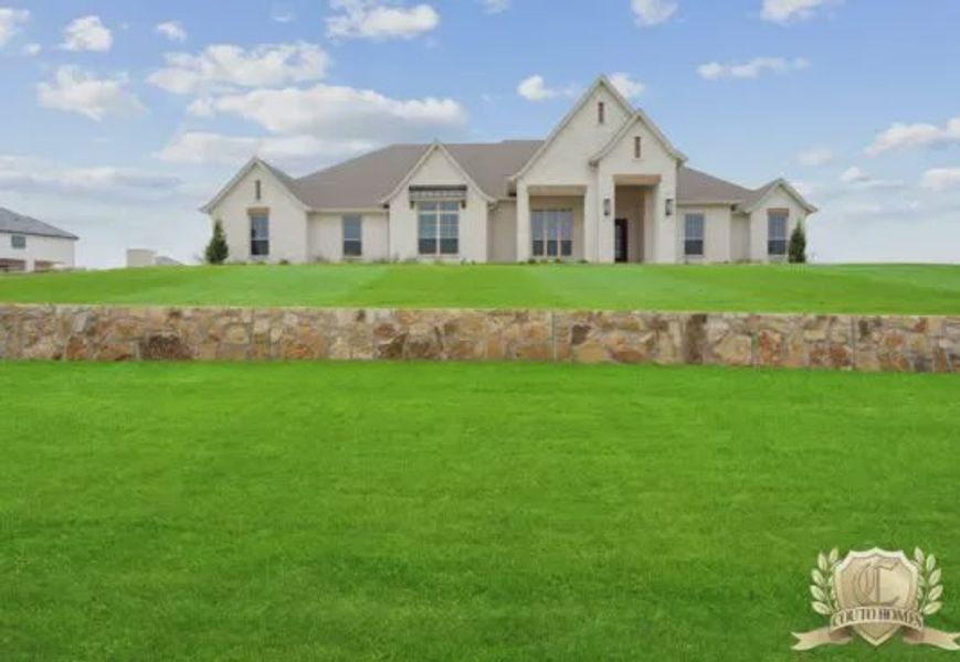 Representative exterior photo of a completed home built from the Fort Worth Custom Homes by Couto Homes in Bella Crossing, Fort Worth, TX (Image 3).