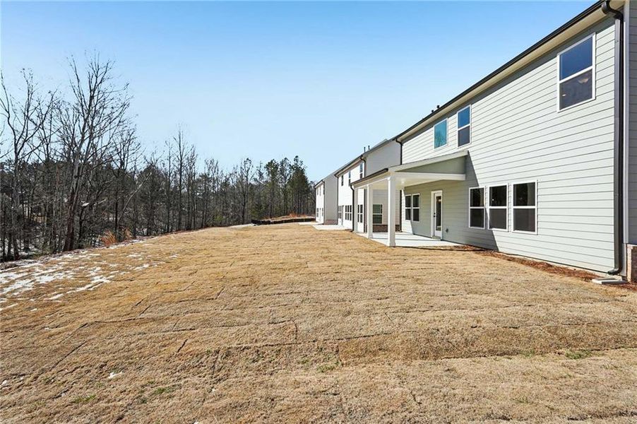 Exterior details and patio area of a home in Arbors at Richland Creek, Buford (Image 28). Exterior details and patio area of a home in Arbors at Richland Creek, Buford (Image 28).
