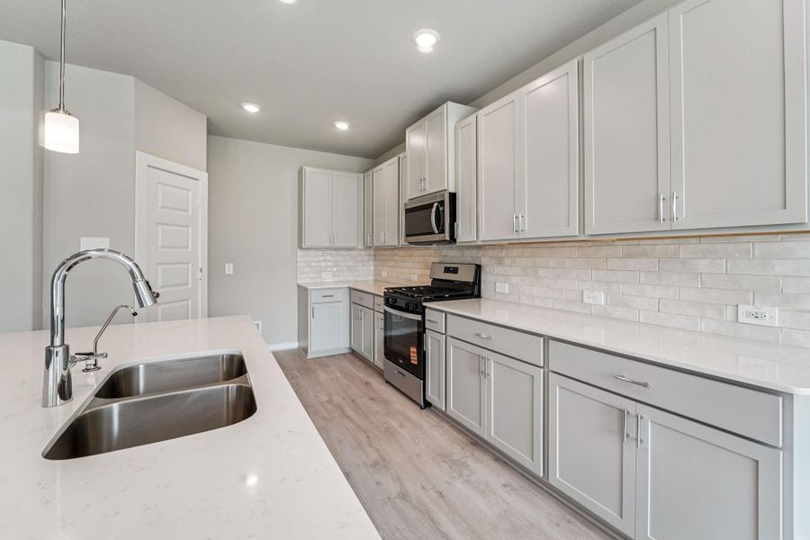 Photo is not of the actual home, but is an inspirational photo of builder’s model home and may depict options, furnishings, and/or decorator features that are not included