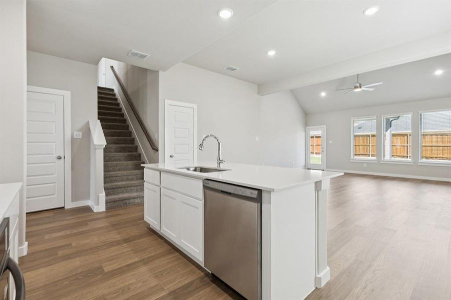 Kitchen in the Stanley II home plan by Trophy Signature Homes – REPRESENTATIVE PHOTO